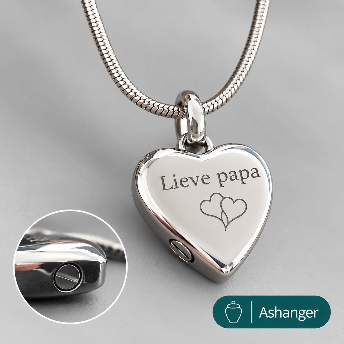 As ketting: zilver hartje met de tekst Lieve papa